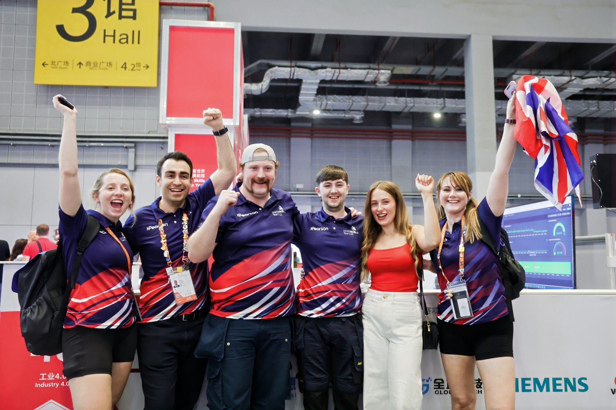 Team UK celebrating a Medal for Excellence in Industry 4.0 at WorldSkills Shanghai 2026